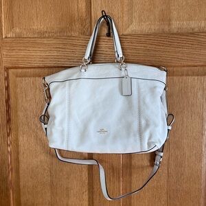 Coach white pebbled leather shoulder bag with dust cover NWOT
Size 17” X 11”